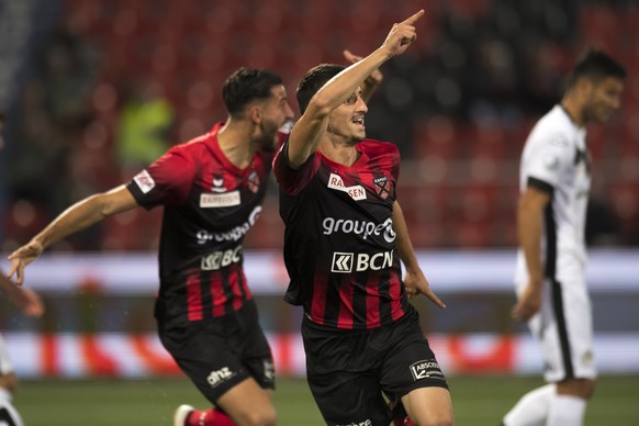 Le joueur neuchatelois Samir Ramizi, centre, celebre le premier but lors de la rencontre de football de Super League entre Neuchatel Xamax FCS et FC Lugano ce mercredi 26 septembre 2018 au stade de la ...