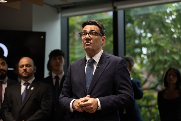 Britain's Prime Minister Andy Burnham arrives and greets staff at No 10 North, in Manchester, England, Friday, July 24, 2026. (James Speakman/Pool photo via AP)
Britain Politics