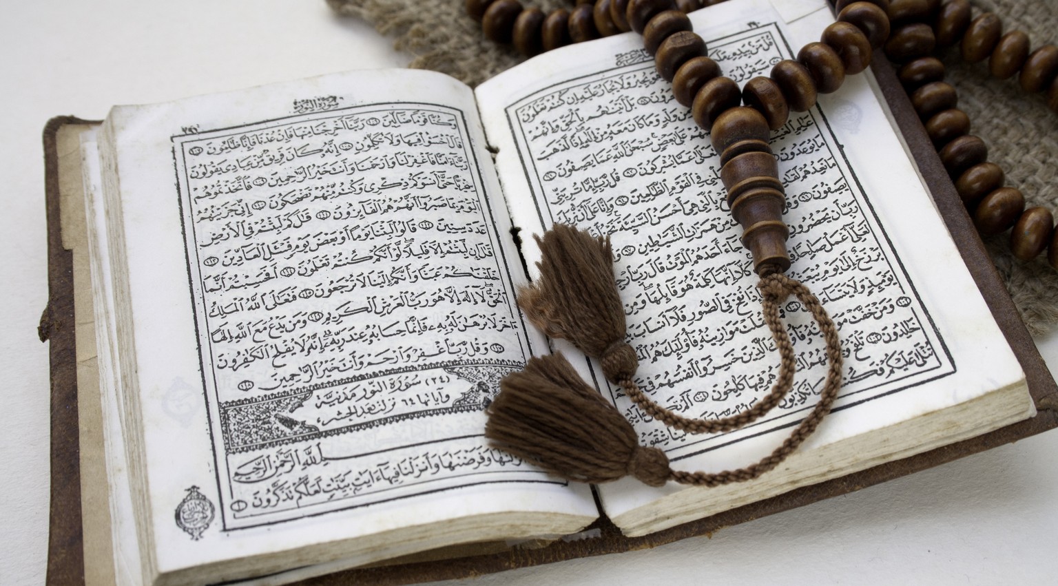 114 der Länge nach geordnete Suren: der Koran.