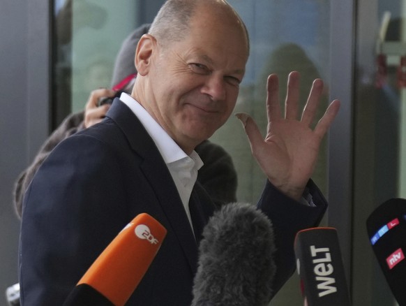 German Finance Minister Olaf Scholz and Social Democratic Party candidate for chancellor arrives for exploratory talks with the SPD, FDP and Green party in Berlin, Germany, Tuesday, Oct. 12, 2021. (Ka ...