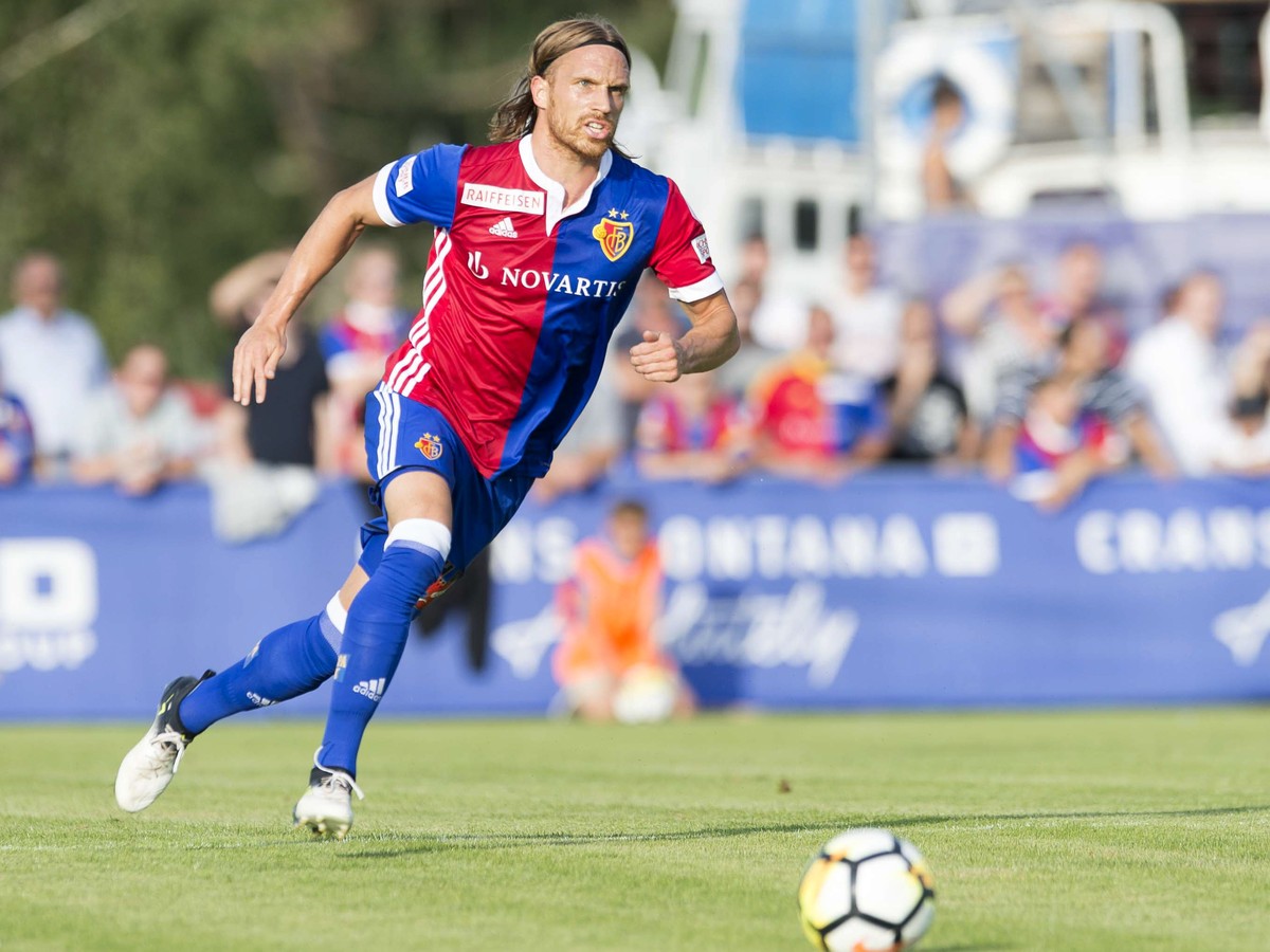 Basel's Michael Lang drives the ball during a friendly soccer match as part of the Festival de Football des Alpes between FC Basel of Switzerland and Sporting Clube of Portugal, at the Stadium of ...