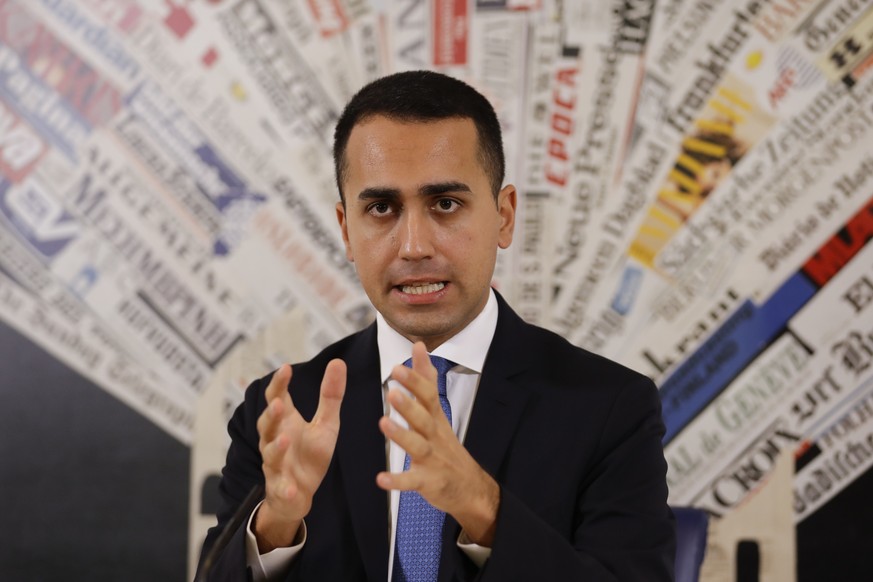 FILE - In this Nov.9, 2018 file photo, Italian deputy Premier and Labor Minister Luigi Di Maio talks to reporters during a press conference at the Foreign Press Association headquarters, in Rome. Fran ...