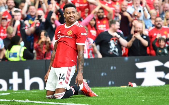 epa09461781 Jesse Lingard of Manchester United celebrates scoring his team&#039;s fourth goal during the English Premier League soccer match between Manchester United and Newcastle United in Mancheste ...