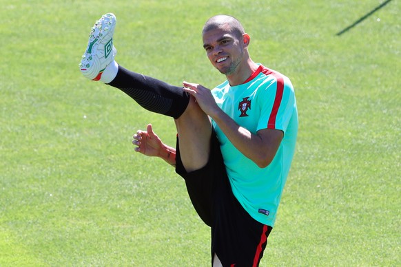 Portugal&#039;s Pepe stretches during a training session in Marcoussis, near Paris, France, Saturday, July 9, 2016. Portugal will face France in a Euro 2016 final soccer match in Saint Denis on Sunday ...