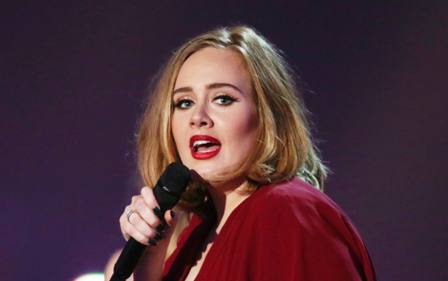 FILE - In this Feb. 24, 2016 file photo shows Adele onstage at the Brit Awards 2016 at the 02 Arena in London. Multiple Grammy Award-winning singer Adele says she turned down an offer to perform at th ...