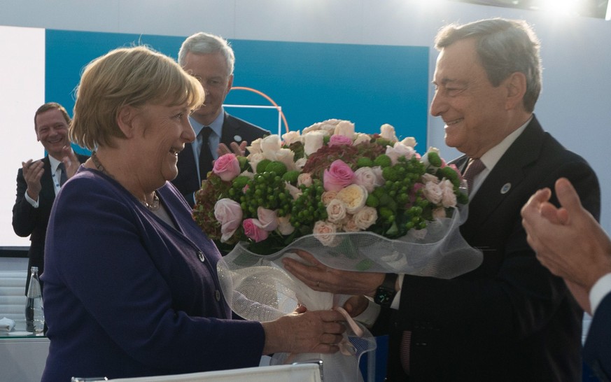 Wurde bei ihrem letzten G20-Gipfel mit einem Strauss bunter Rosen verabschiedet: Angela Merkel.