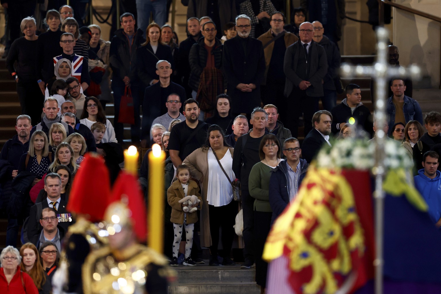 Members of the public pay their respects to Queen Elizabeth II during the lying in State inside Westminster Hall, at the Palace of Westminster in London, Sunday, Sept. 18, 2022. (Jeff J Mitchell/Pool  ...