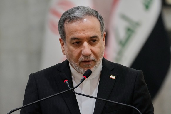 Iranian Foreign Minister Abbas Araghchi speaks during a news conference with his Iraqi counterpart Fouad Hussein after their meeting at the foreign ministry in Baghdad, Iraq, Sunday, June 28, 2026. (A ...