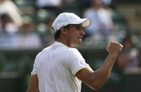 Austria&#039;s Dominic Thiem celebrates a point against Gilles Simon of France during their Men&#039;s Singles Match on day four at the Wimbledon Tennis Championships in London Thursday, July 6, 2017. ...