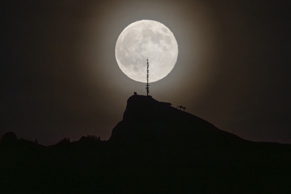 A full moon shines above the summit of &quot;Chamossaire&quot; in the Vaud Alps in Switzerland on Wednesday, November 5, 2025. This full moon, known as the Beaver Moon, is the second supermoon of 2025 ...