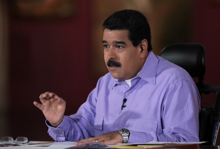 Venezuela&#039;s President Nicolas Maduro speaks during his weekly broadcast &quot;En contacto con Maduro&quot; (In contact with Maduro) in Caracas, Venezuela July 26, 2016. Miraflores Palace/Handout  ...