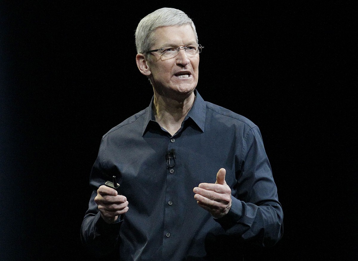 FILE - In this June 2, 2014, file photo, Apple CEO Tim Cook speaks at the Apple Worldwide Developers Conference event in San Francisco. Cook says that so-called "religious objection" legisla ...