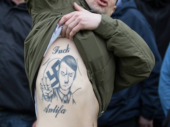 March 28, 2015 - Manchester, Greater Manchester, UK - Manchester , UK . A man with a large Adolf Hitler tattoo on his torso . Approximately 100 neo-Nazis gather in Manchester for White Pride Worldwide ...