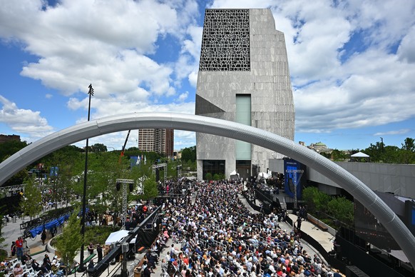 epa13047797 A structural arch frames the outdoor seating area during the opening ceremony at the Obama Presidential Center in Chicago, Illinois, USA, 18 June 2026. The Obama Presidential Center in Chi ...