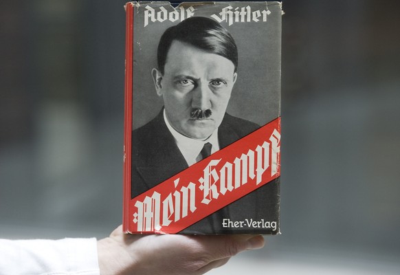Adolf Hitler&#039;s infamous memoir &quot;Mein Kampf&quot; is presented during a news conference in Nuremberg, southern Germany, Tuesday, April 24, 2012. The state of Bavaria that owns the copyrights  ...
