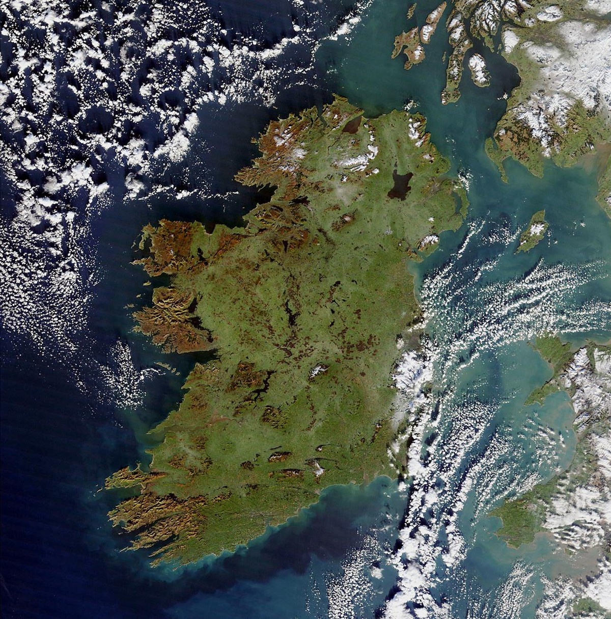 This NASA Terra satellite Moderate Resolution Imaging Spectroradiometer (MODIS) image released 17 January 2003 shows Ireland as it appeared 04 January. The rugged cliffs that mark the island's we ...