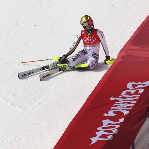 Lena Duerr, of Germany sits in the finish area after the second run of the women&#039;s slalom at the 2022 Winter Olympics, Wednesday, Feb. 9, 2022, in the Yanqing district of Beijing. (AP Photo/Aless ...
