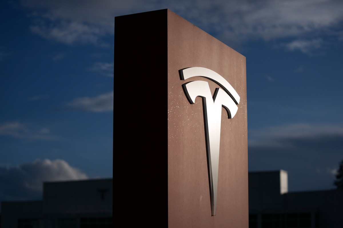 FILE - A sign for Tesla is displayed at a facility on Wednesday, April 15, 2026, in Portland, Ore. (AP Photo/Jenny Kane, File)
Tesla-Results