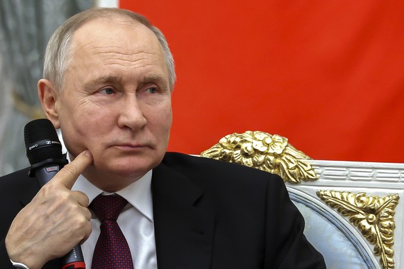 FILE - Russian President Vladimir Putin appears at an event at the Kremlin in Moscow, Russia, Monday, Dec. 18, 2023. Putin seems to be hoping that relentless military pressure, combined with changing  ...