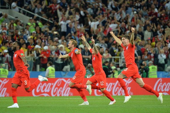 epa06862562 England players (from left) Danny Rose, Harry Kane, Kieran Trippier and John Stones celebrate after winning the penalty shootout in the FIFA World Cup 2018 round of 16 soccer match between ...