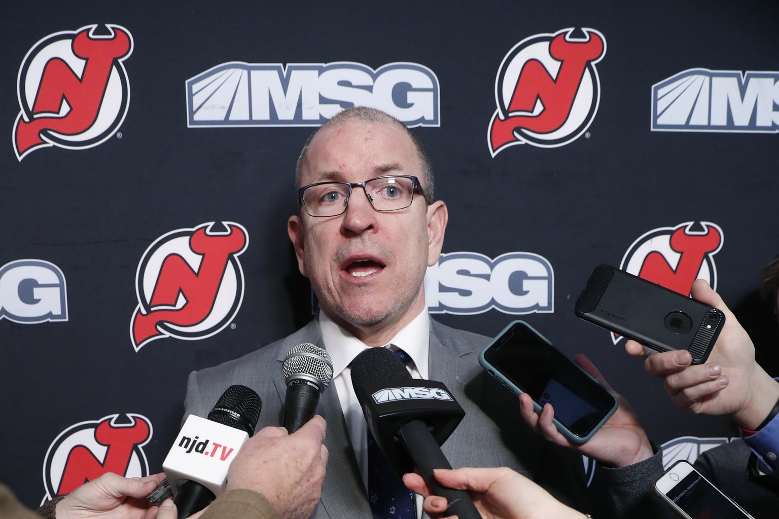 New Jersey Devils interim general manager Tom Fitzgerald anwers reporters' questions after the Devils announced that captain Andy Greene was traded to the New York Islanders, Sunday, Feb. 16, 2020, be ...