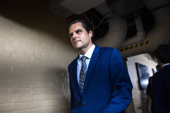 epa10898570 Florida Republican Rep. Matt Gaetz walks to a Republican conference meeting after former House Speaker Kevin McCarthy was removed from his leadership position in the United States.