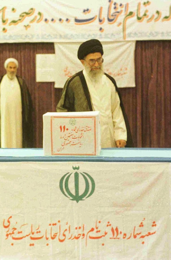 Leader of the Iranian Islamic Revolution, Ayatollah Seyed Ali Khamenei, after he cast his vote in a polling station in Teheran, during the seventh Iranian presidential elections since the Islamic Revo ...