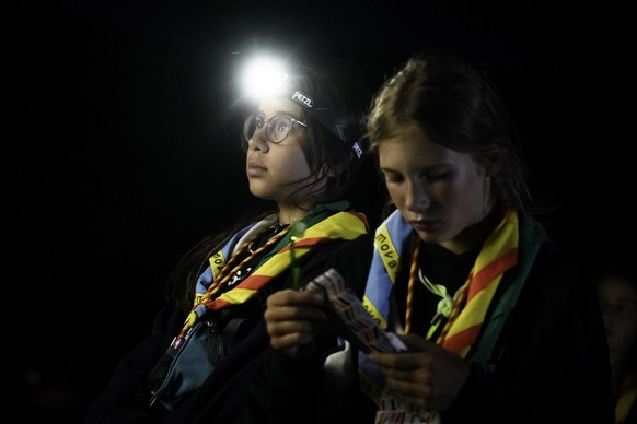 epa10088753 Young scouts prepare for sleep after the end of the first day of the Federal Scout Camp &#039;mova&#039; in the Goms Valley in Ulrichen, Switzerland, 23 July 2022. The biggest scout camp e ...