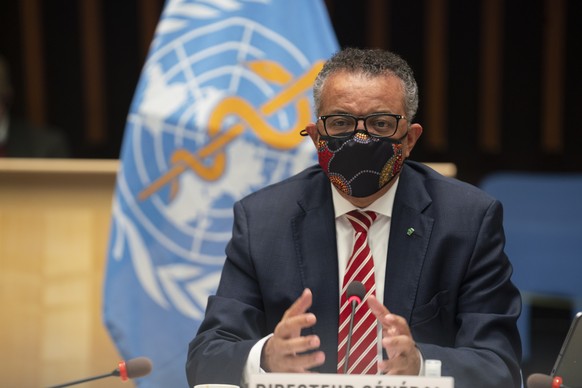 In this photo released by WHO, World Health Organisation on Monday, Oct. 5, 2020, WHO Director-General, Dr Tedros Adhanom Ghebreyesus, wearing a mask to protect against coronavirus, gestures during a  ...