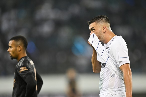 epa10170945 Zurich&#039;s Mirlind Kryeziu, right, reacts during the UEFA Europa League Group A soccer game between Switzerland&#039;s FC Zuerich and England&#039;s Arsenal, at the Kybunpark stadium, i ...