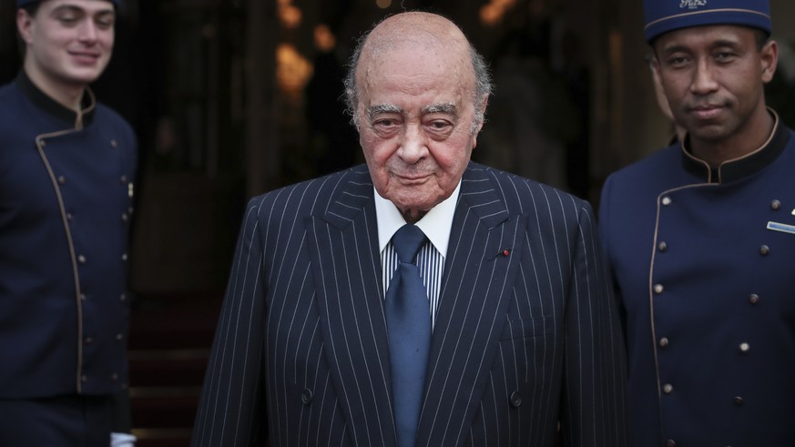 FILE - Egyptian businessman and Ritz hotel owner Mohamed Al Fayed poses with his hotel staff in Paris, June 27, 2016. (AP Photo/Kamil Zihnioglu, File)
Mohamed Al Fayed