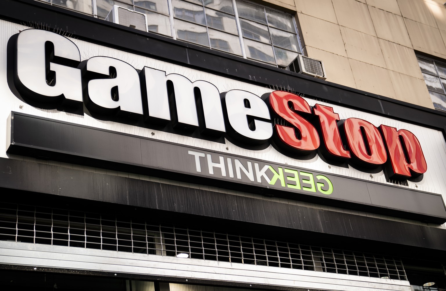 Pedestrians pass a GameStop store on 14th Street at Union Square, Thursday, Jan. 28, 2021, in the Manhattan borough of New York. Robinhood and other online trading platforms are moving to restrict tra ...