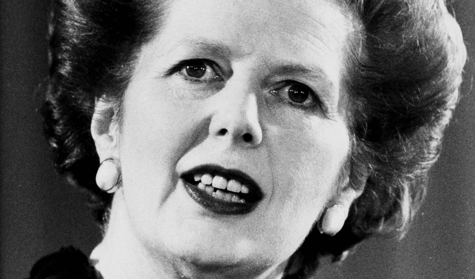 Premier Margaret Thatcher gives a speech, June 6, 1983. (AP Photo/Press Association)