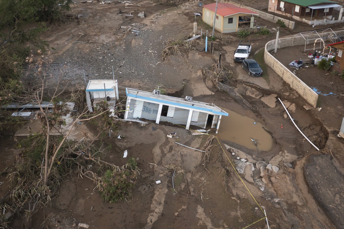 A house lays in the mud after it was washed away by Hurricane Fiona at Villa Esperanza in Salinas, Puerto Rico, Wednesday, Sept. 21, 2022. Fiona left hundreds of people stranded across the island afte ...