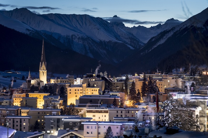 The ski resort of Davos is pictured by night two days before the 49th Annual Meeting of the World Economic Forum, WEF, in Davos, Switzerland, Sunday, January 20, 2019. The meeting brings together entr ...