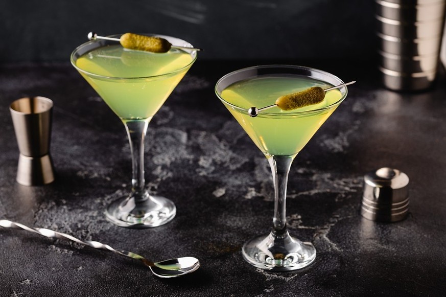 Dill Pickle Martini Cocktail - basically a Dirty Martini with a dill pickle instead of an olive.