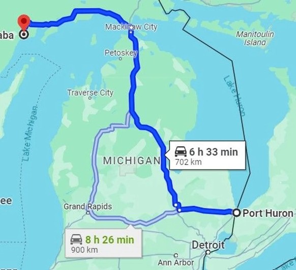 The route from Escanaba to Port Huron: There is approximately 700 kilometers between the cities.  (Source: Google Maps)