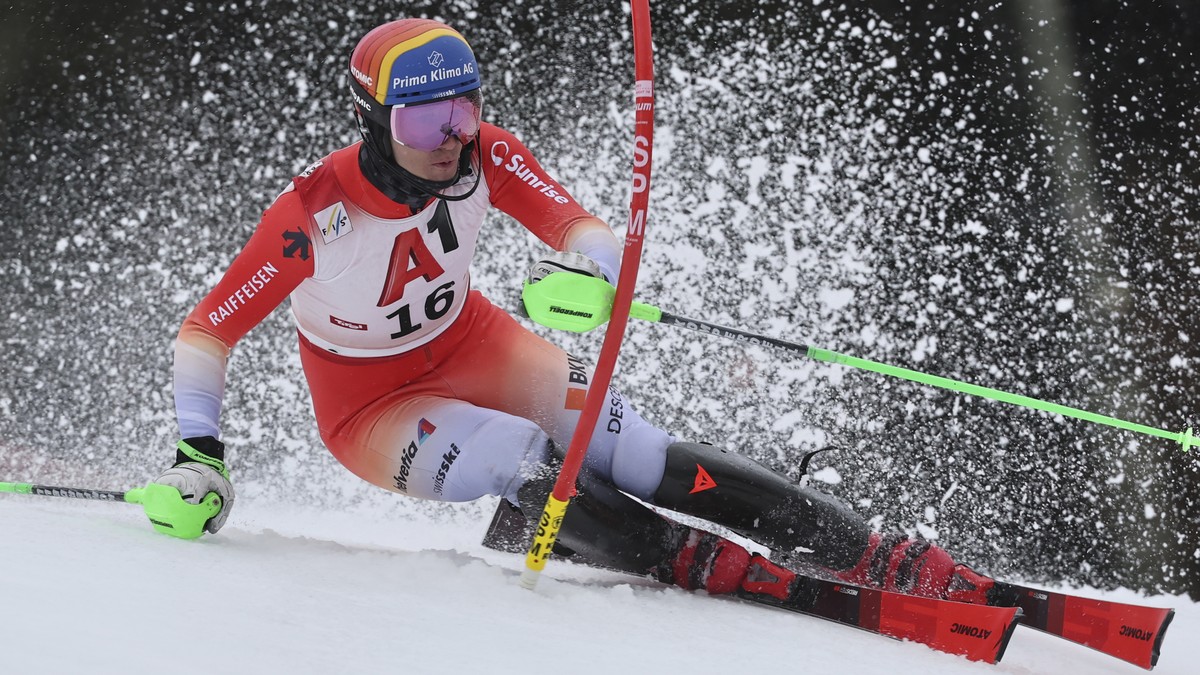 Switzerland's Tanguy Nef speeds down the course during an alpine ski, men's World Cup slalom, in Kitzb