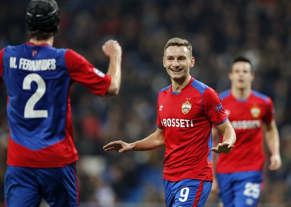 CSKA forward Fedor Chalov celebrates after scoring his side&#039;s opening goal during the Champions League, Group G soccer match between Real Madrid and CSKA Moscow, at the Santiago Bernabeu stadium  ...