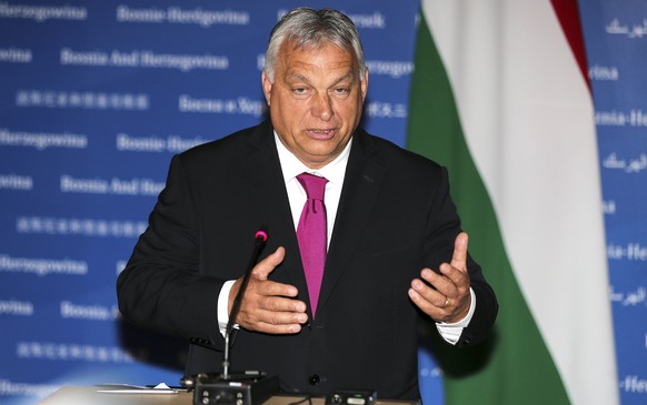 epa10705545 Hungarian Prime Minister Viktor Orban gestures as he speaks during a joint press conference with the chairperson of the Council of Ministers of Bosnia and Herzegovina, Borjana Kristo (not pictured)…