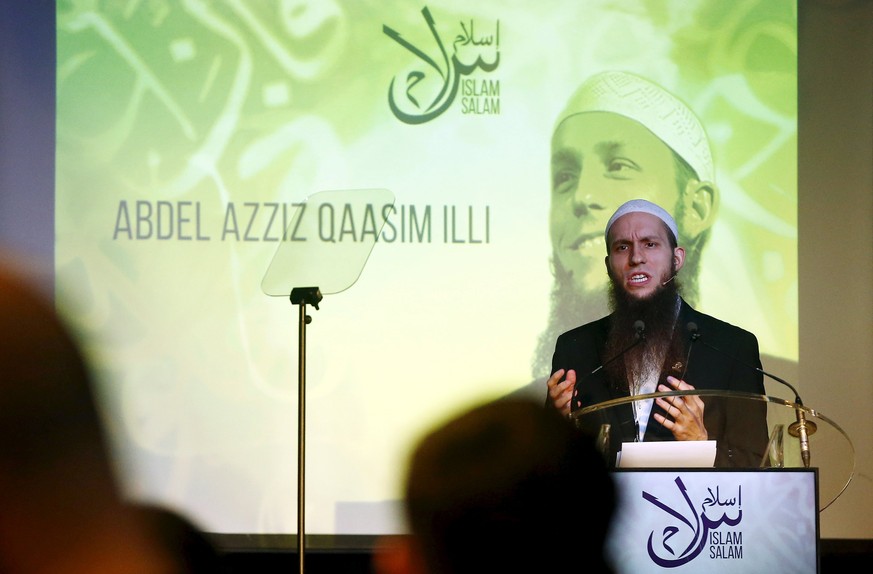 Head of Public Affairs of the Islamic Central Council of Switzerland (ICCS) Abdel Azziz Qaasim Illi speaks to members of ICCS during the &quot;United in Peace&quot; event in Kehrsatz near Bern, Switze ...