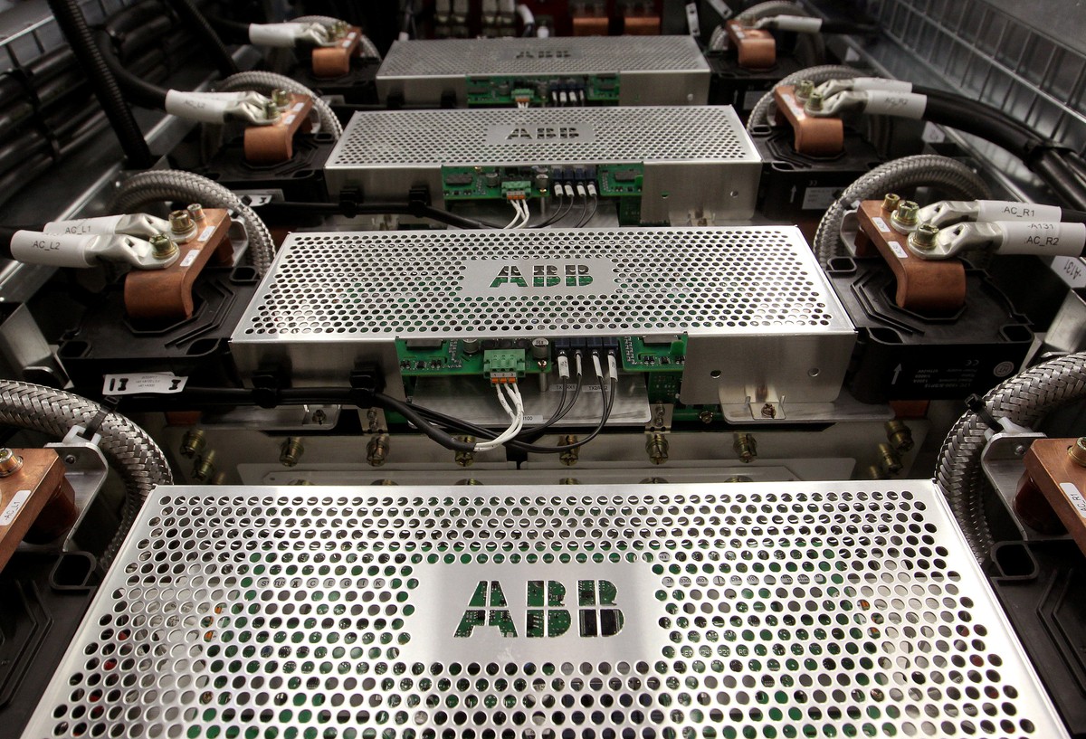 The company's logo is seen on protection grids of a traction transformer at a plant of Swiss engeneering group ABB in the town of Turgi west of Zurich June 9, 2010. REUTERS/Arnd Wiegmann/File Pho ...