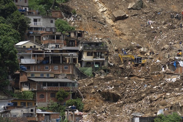 Alex Sandro Conde&#039;s house stands next to the devastation caused by a landslide at Morro da Oficina, a hillside part of Alto da Serra, Petropolis, Rio de Janeiro state, Brazil, Tuesday, Feb. 22, 2 ...