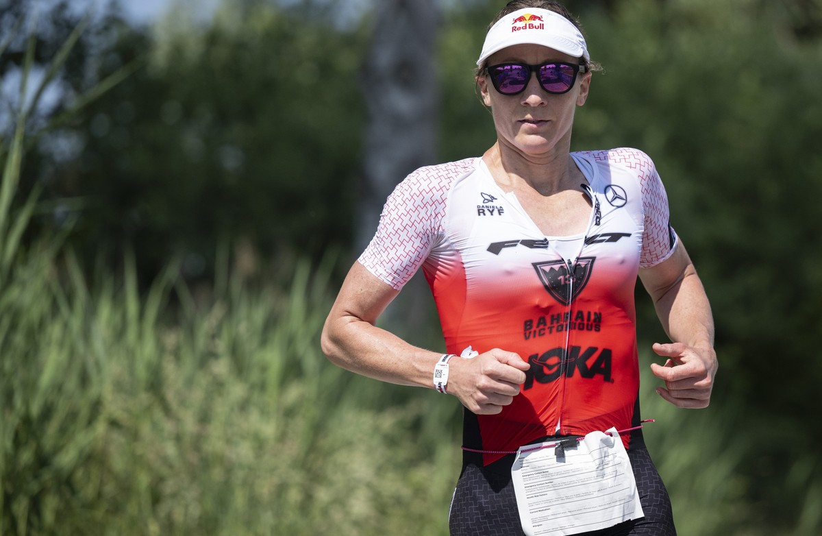 Switzerland's Daniela Ryf runs during the Ironman 70.3 triathlon in Rapperswil, Switzerland, Sunday, June 11, 2023. (KEYSTONE/Ennio Leanza)