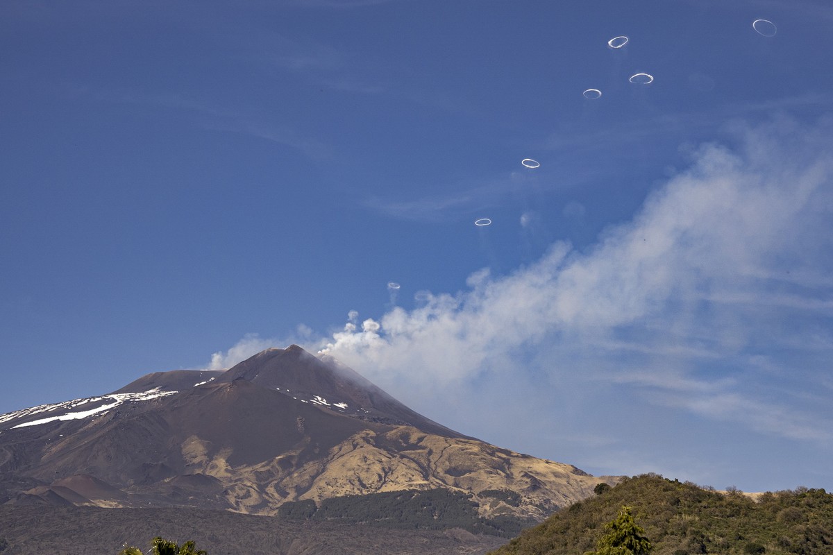 Volcanic vortex rings emerge from a new pit crater on the north side of the southeast crater of the Etna Volcano in Sicily, Italy, Friday, April 5, 2024. While the physical conditions under which volc ...