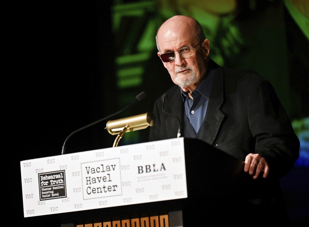 FILE - Author Salman Rushdie receives the Vaclav Havel Library Foundation's first ever lifetime achievement disturbing the peace award at the Vaclav Havel Center in New York on Nov. 14, 2023. Aft ...
