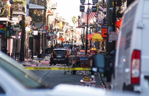 epa11801713 Police respond in the French Quarter after a car plowed into a crowd in New Orleans, Louisiana, USA, 01 January 2025. At least 10 people are dead and 30 injured after a man drove a white p ...