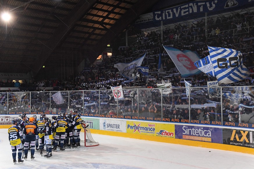 Ambri&#039;s players and fans celebrate the victory of the regular season game of National League Swiss Championship 2017/18 between HC Ambri Piotta and HC Davos, at the ice stadium Valascia in Ambri, ...