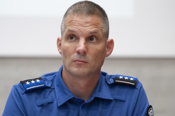 epa13200944 Captain Matthias Schildknecht, Chief of the Stationed Police Division, attends a press conference following a shooting at a rave event at the Schachen horse racing track in Aarau, Switzerl ...