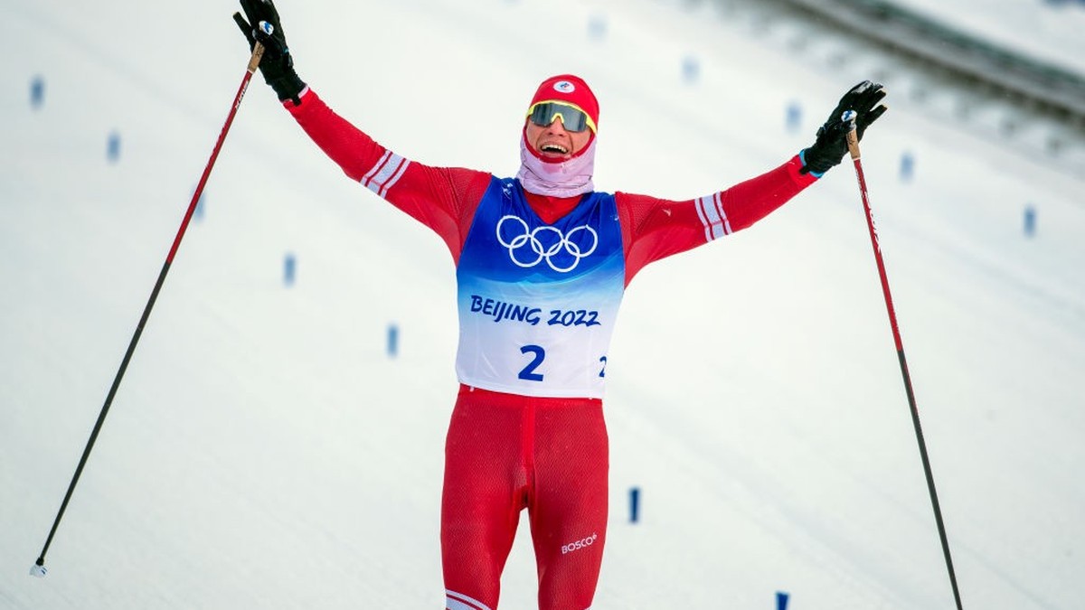 BEIJING, CHINA - February 19: Alexander Bolshunov of ROC wins the gold medal in the Men's 50km Mass Start Olympic Cross-Country ski race, reduced to 30km because of the freezing weather at the Zh ...